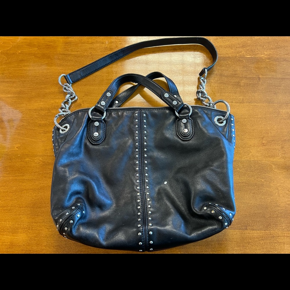 Black leather Michael Kors purse with silver studs, silver/black strap
